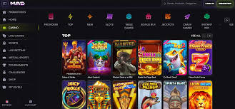 Madcasino – zrzut ekranu lobby z polecanymi automatami, okładka recenzji